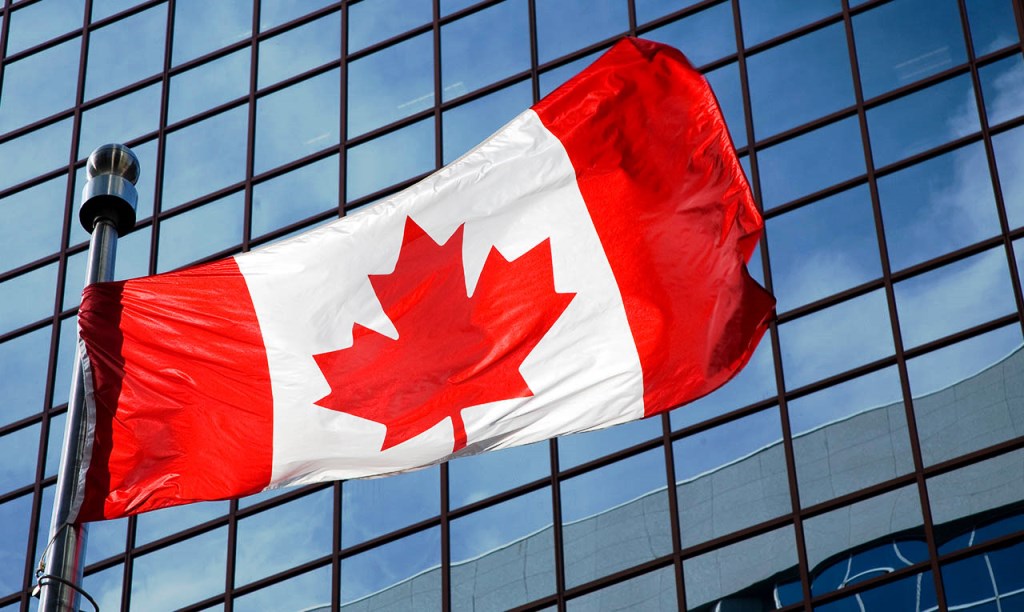 Canadian flag in front of a government building