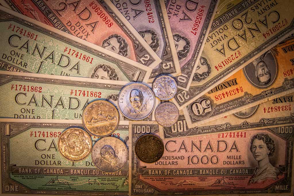 collection of Canadian banknotes and coins